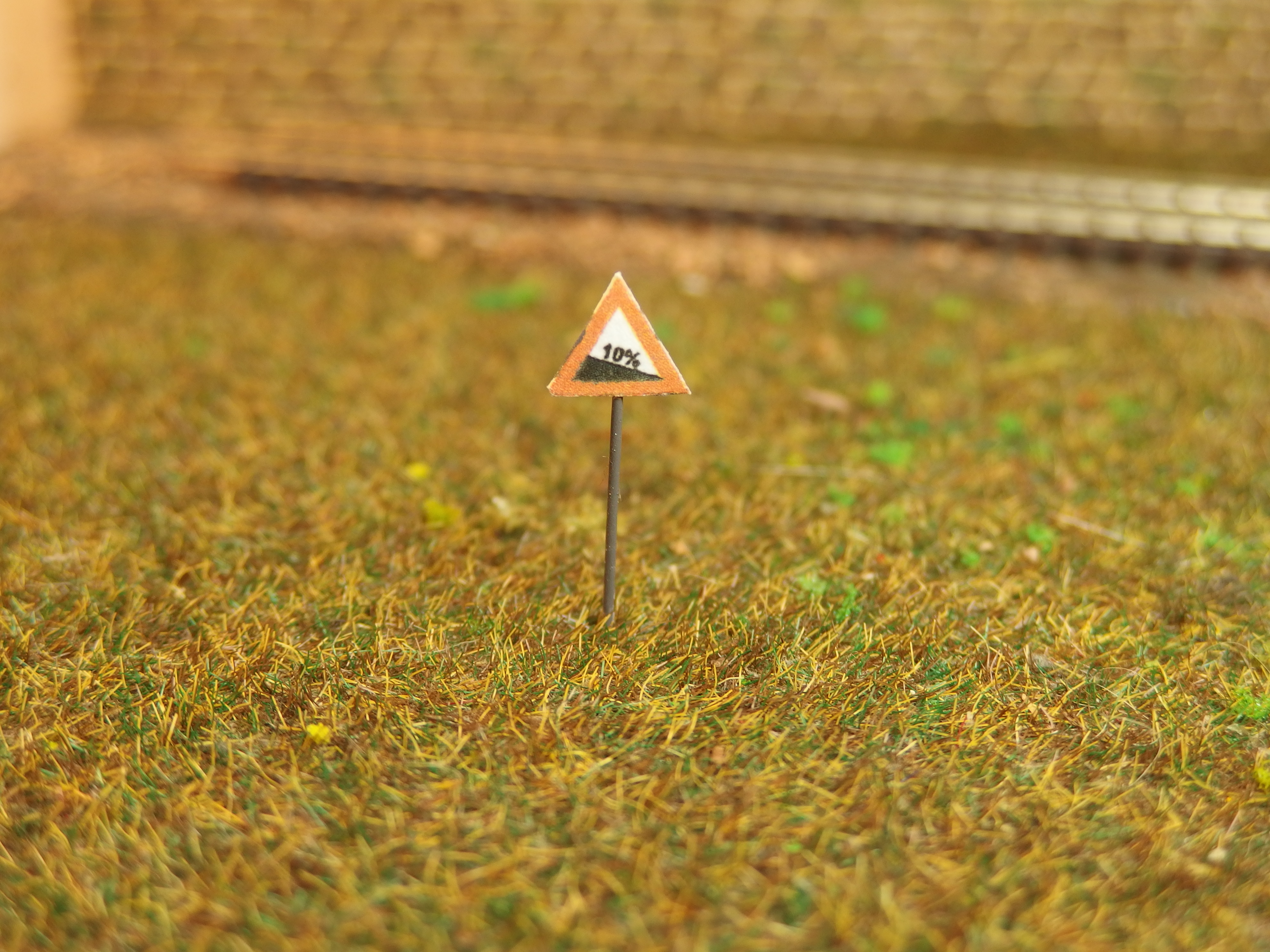 Dorpavní značka nebezpečné klesání 12% HO 03115